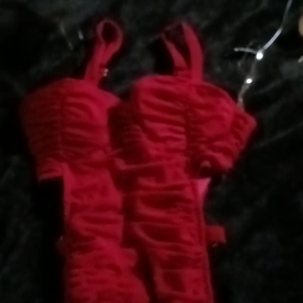 A Medium red dress the brand is Kaylee Kollection